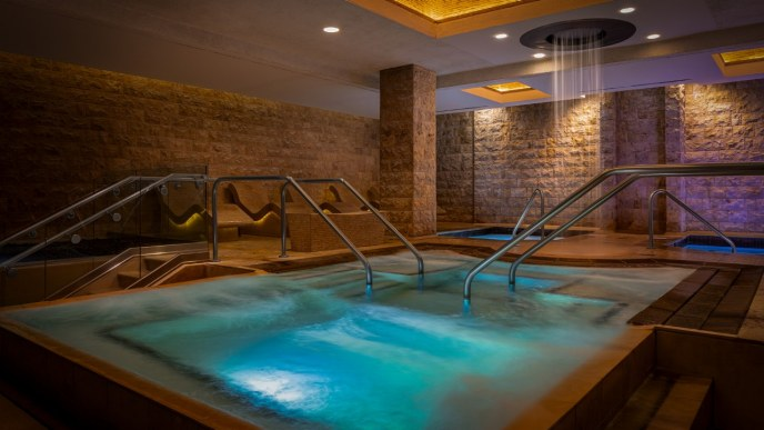 Warmly lit spa pools at Caesars Palace
