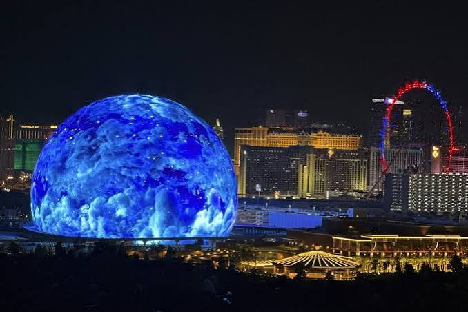 The Sphere illuminated blue above the Las Vegas skyline